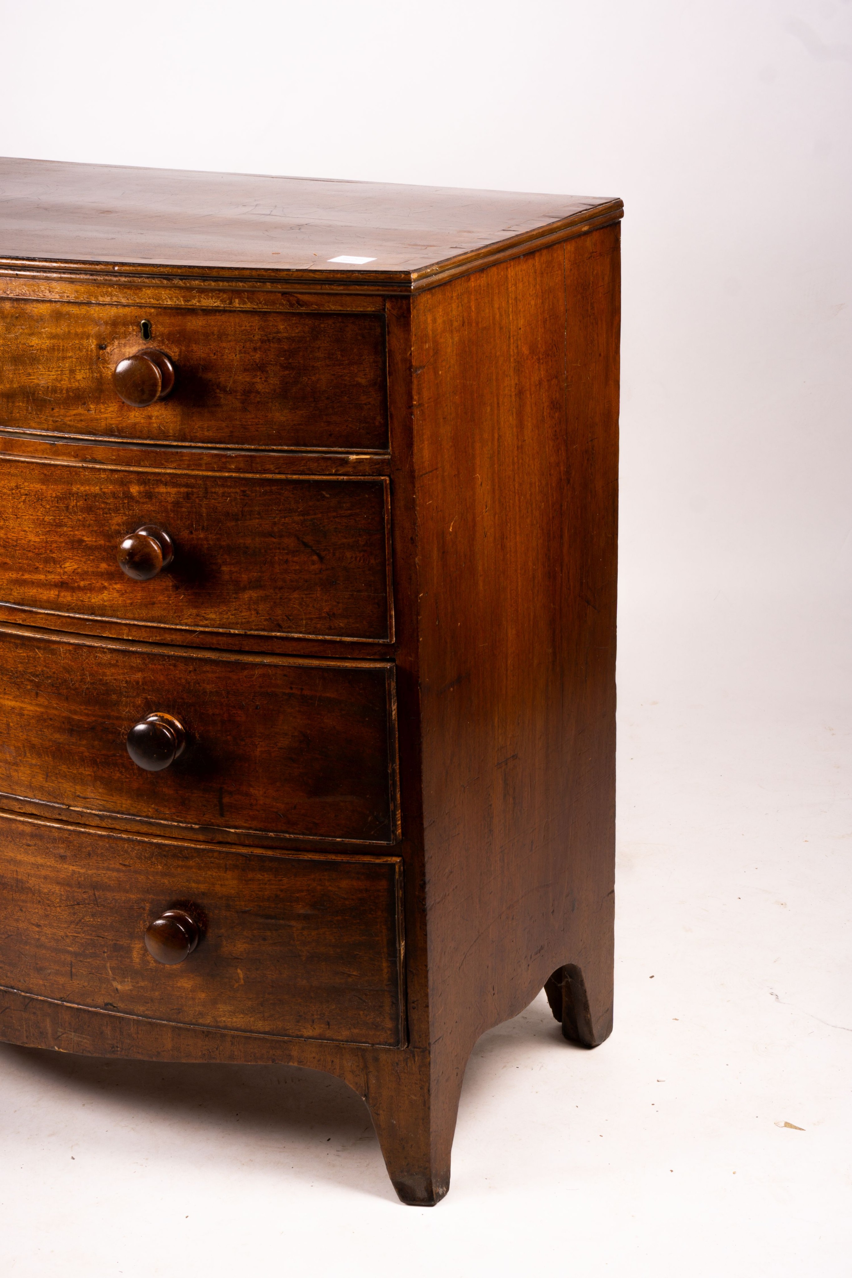 A George IV banded mahogany bowfront chest, width 108cm, depth 57cm, height 105cm